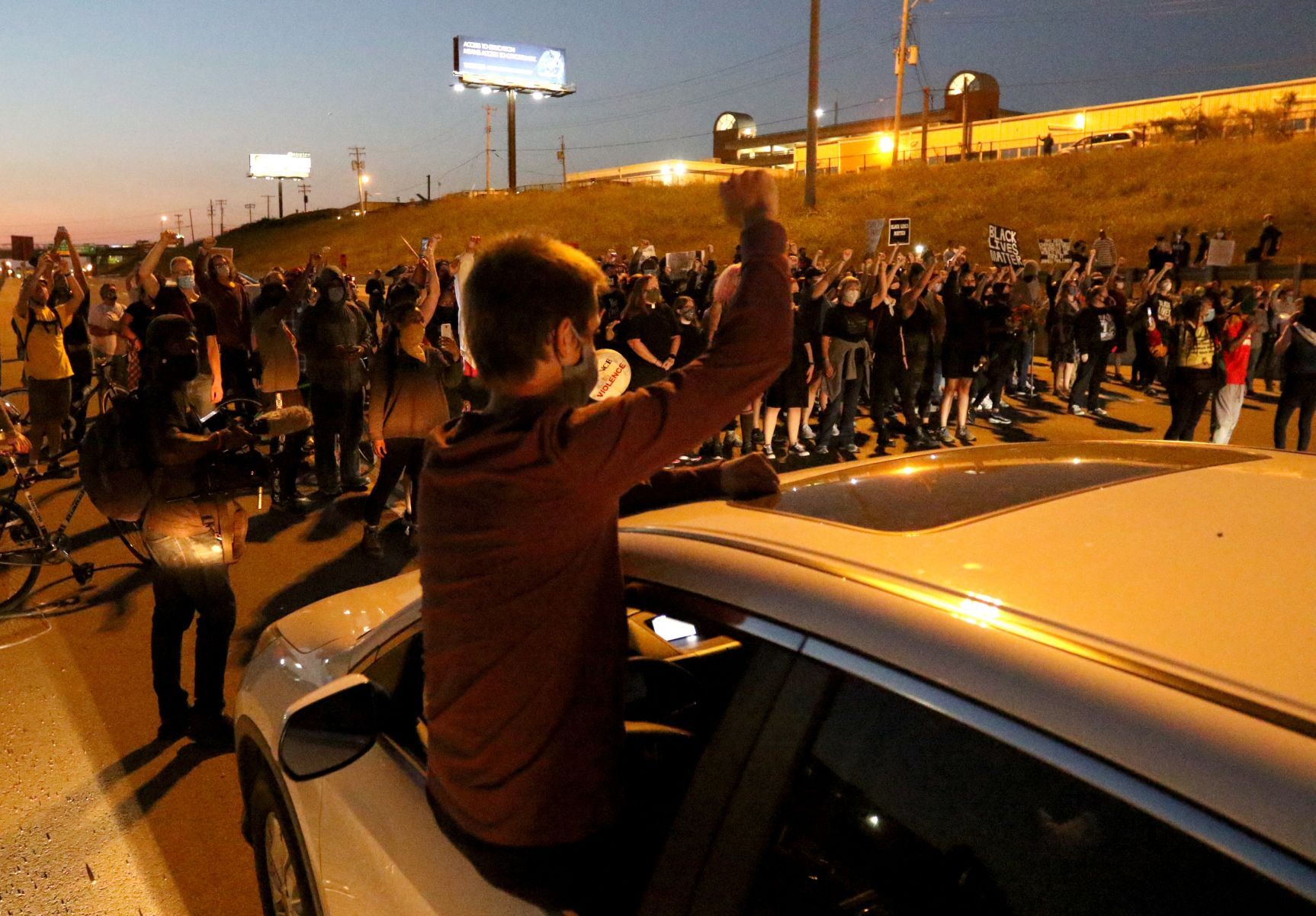 Protestors march onto Interstate 64